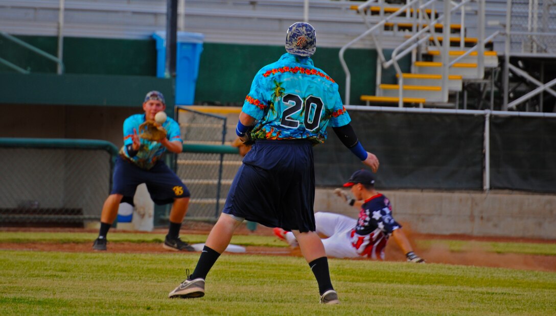 Marysville Gold Sox pitcher Ty Overboe throws the ball to third base during a softball game with the Beale All-Stars July 30, 2014, at Appeal-Democrat Park in Marysville, Calif. The Beale All-Stars came out victorious in a 7-4 win. (U.S. Air Force photo by Airman 1st Class Ramon A. Adelan/ Released)