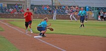 Senior Airman Kyle Brubaker, Beale All-Stars second baseman, gets thrown out at first base during a softball game with the Marysville Gold Sox July 30, 2014, at Appeal-Democrat Park in Marysville, Calif. The game ended with a 7-4 Beale All-Stars victory. (U.S. Air Force photo by Airman 1st Class Ramon A. Adelan/ Released)