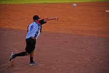 Senior Airmen Richard Rivera, Beale All-Stars third baseman, throws the ball to first base during a softball game the Marysville Gold Sox July 30, 2014, at Appeal-Democrat Park in Marysville, Calif. The Beale All-Stars came out victorious in a 7-4 win. (U.S. Air Force photo by Airman 1st Class Ramon A. Adelan/ Released)