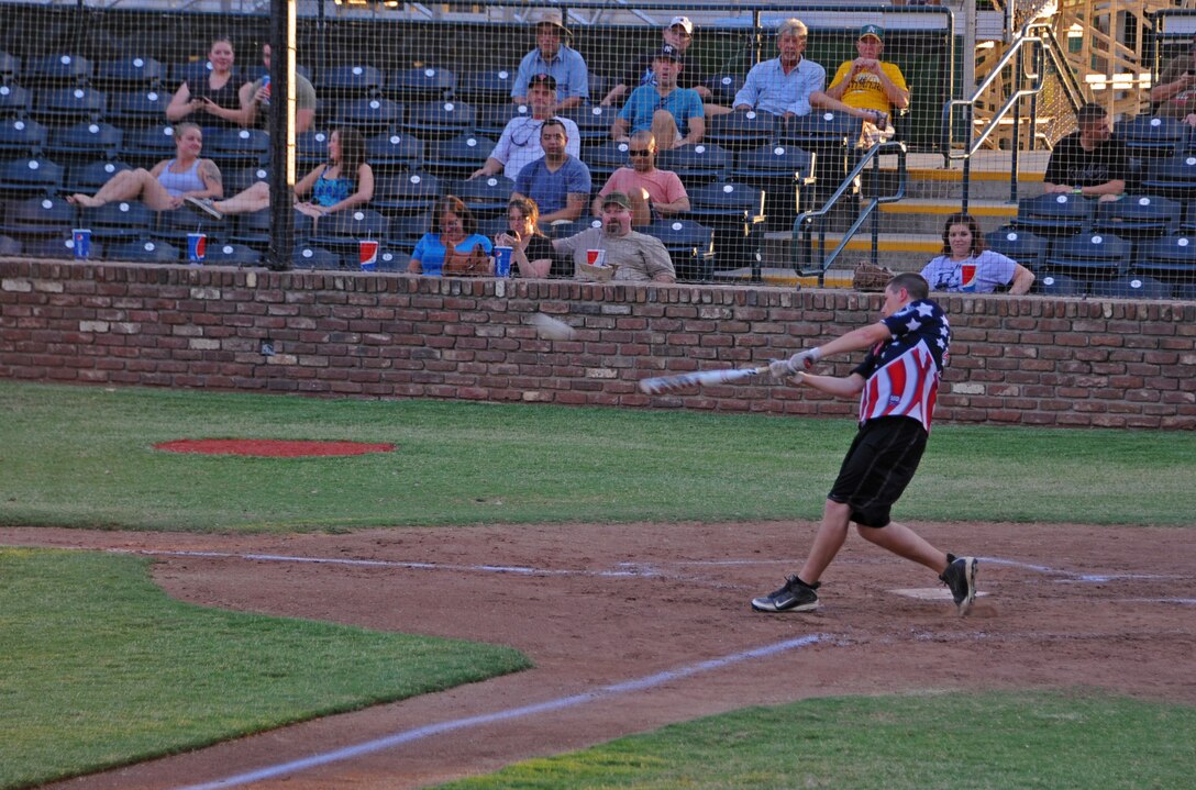 Senior Airman Addam LaMora, Beale All-Stars second baseman, takes a swing during a softball game with the Marysville Gold Sox July 30, 2014, at Appeal-Democrat Park in Marysville, Calif. More than 100 guests attended the game. (U.S. Air Force photo by Airman 1st Class Ramon A. Adelan/ Released)