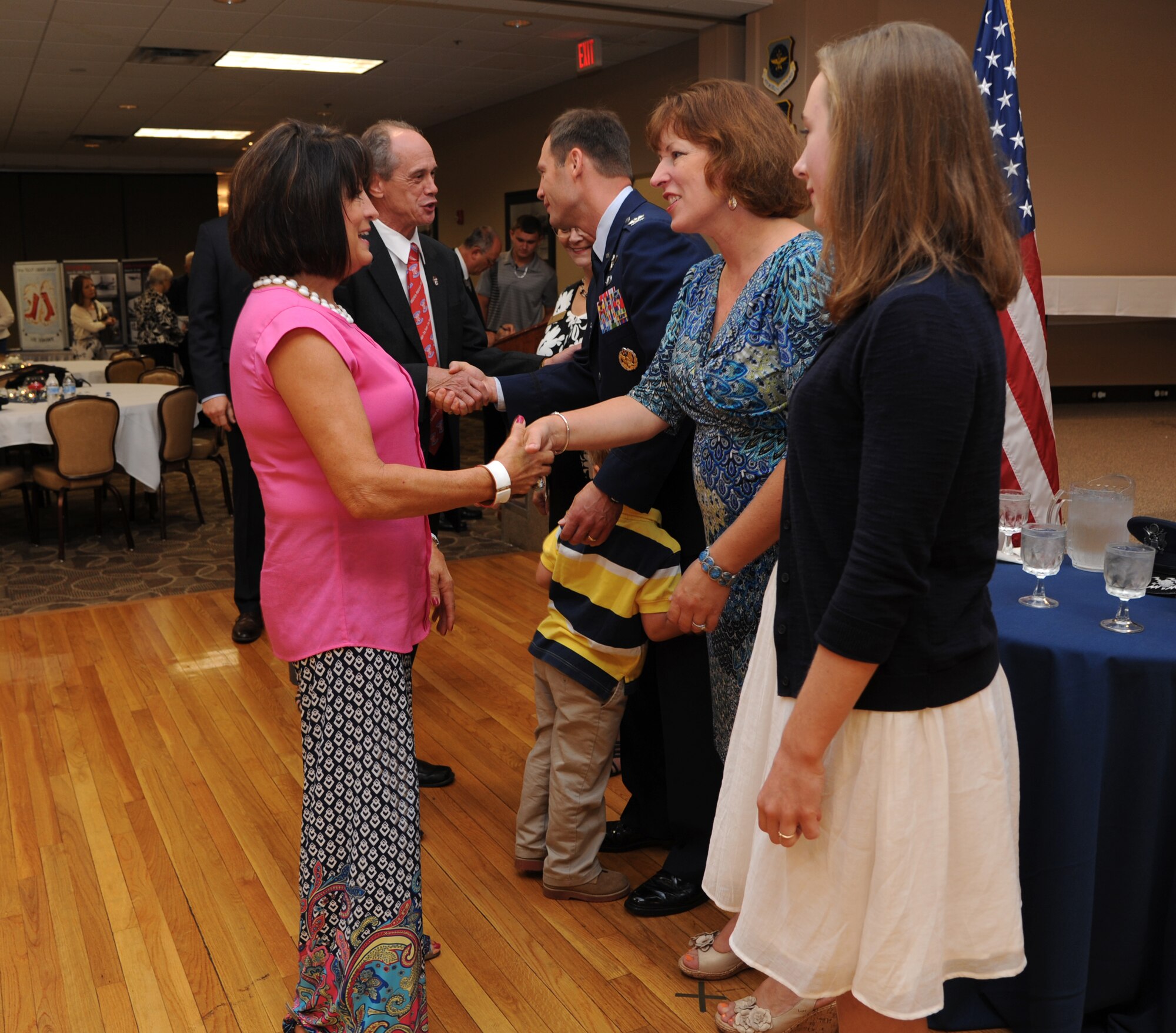 Team Little Rock civic leaders and community members welcome Col. James Dryjanski, 314th Airlift Wing commander, and his family July 31, 2014, at Little Rock Air Force Base, Ark. Dryjanski became the commander of the 314th AW after Col. Scott Brewer relinquished command. (U.S. Air Force photo by Airman 1st Class Mercedes Muro) 