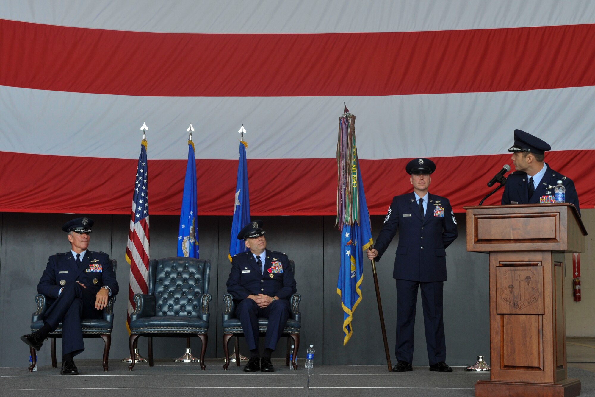 Col. James Dryjanski, 314th Airlift Wing commander, gives thank to Maj. Gen. Michael Keltz, the director of Intelligence, Operations and Nuclear Integration, Headquarters Air Education and Training Command, and Col. Scott Brewer, former 314th AW commander, July 31, 2014, during the 314th AW change of command ceremony at Little Rock Air Force Base, Ark. (U.S. Air Force photo by Senior Airman Regina Agoha)