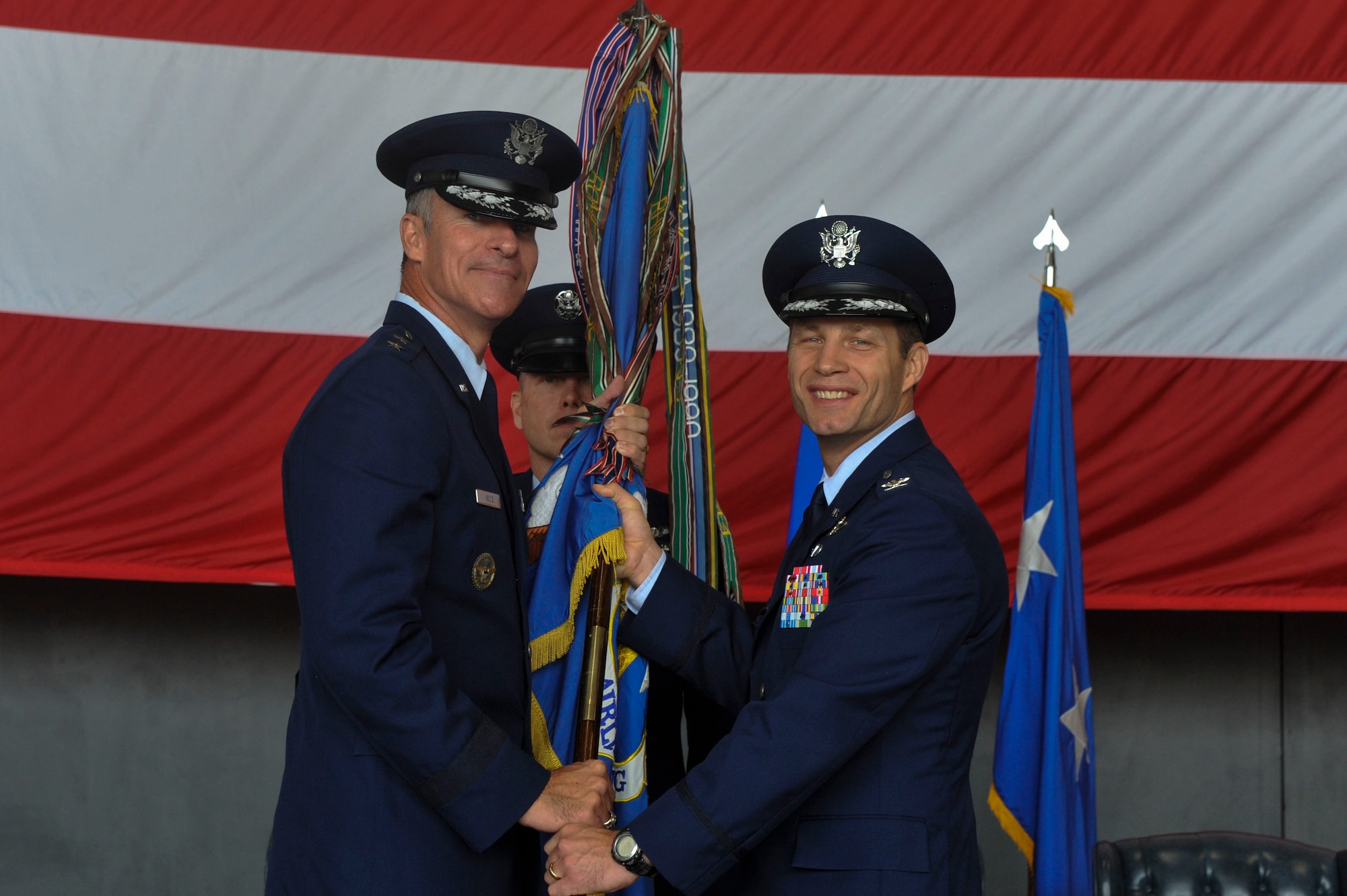 Col. James Dryjanski, 314th Airlift Wing commander, assumes command July 31, 2014, at Little Rock Air Force Base, Ark. Maj. Gen. Michael Keltz, the director of Intelligence, Operations and Nuclear Integration, Headquarters Air Education and Training Command officiated the change of command ceremony. (U.S. Air Force photo by Senior Airman Regina Agoha)