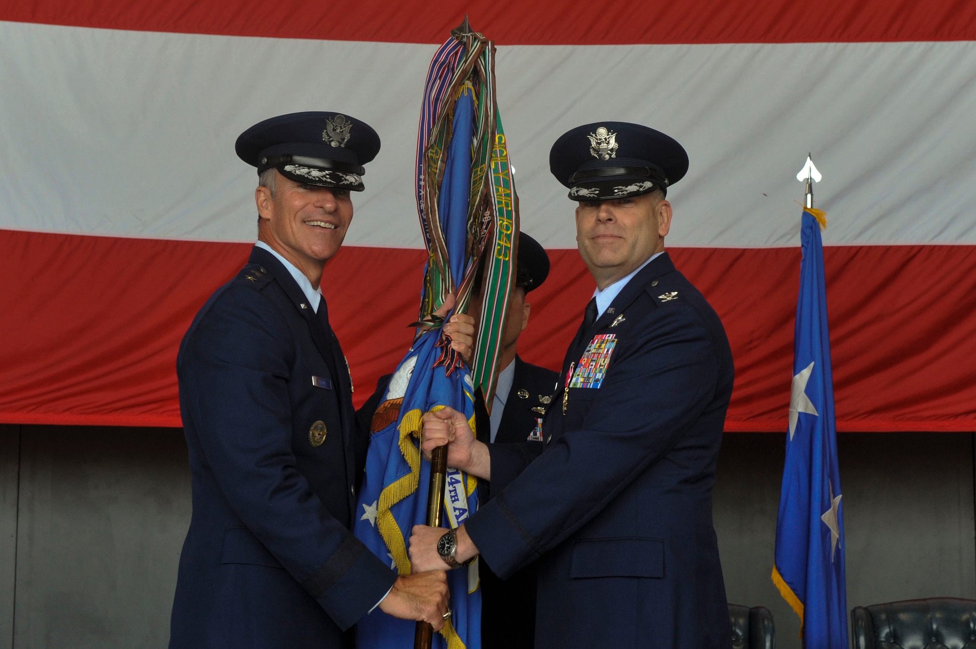 Col. Scott Brewer, former 314th Airlift Wing commander, relinquishes command July 31, 2014, at Little Rock Air Force Base, Ark. Brewer was in command of the 314th AW for 25 months and leaves the wing to become the next chief of concepts, Strategy and Wargaming Division, Headquarters Air Force, Pentagon, Washington D.C. (U.S. Air Force photo by Senior Airman Regina Agoha)