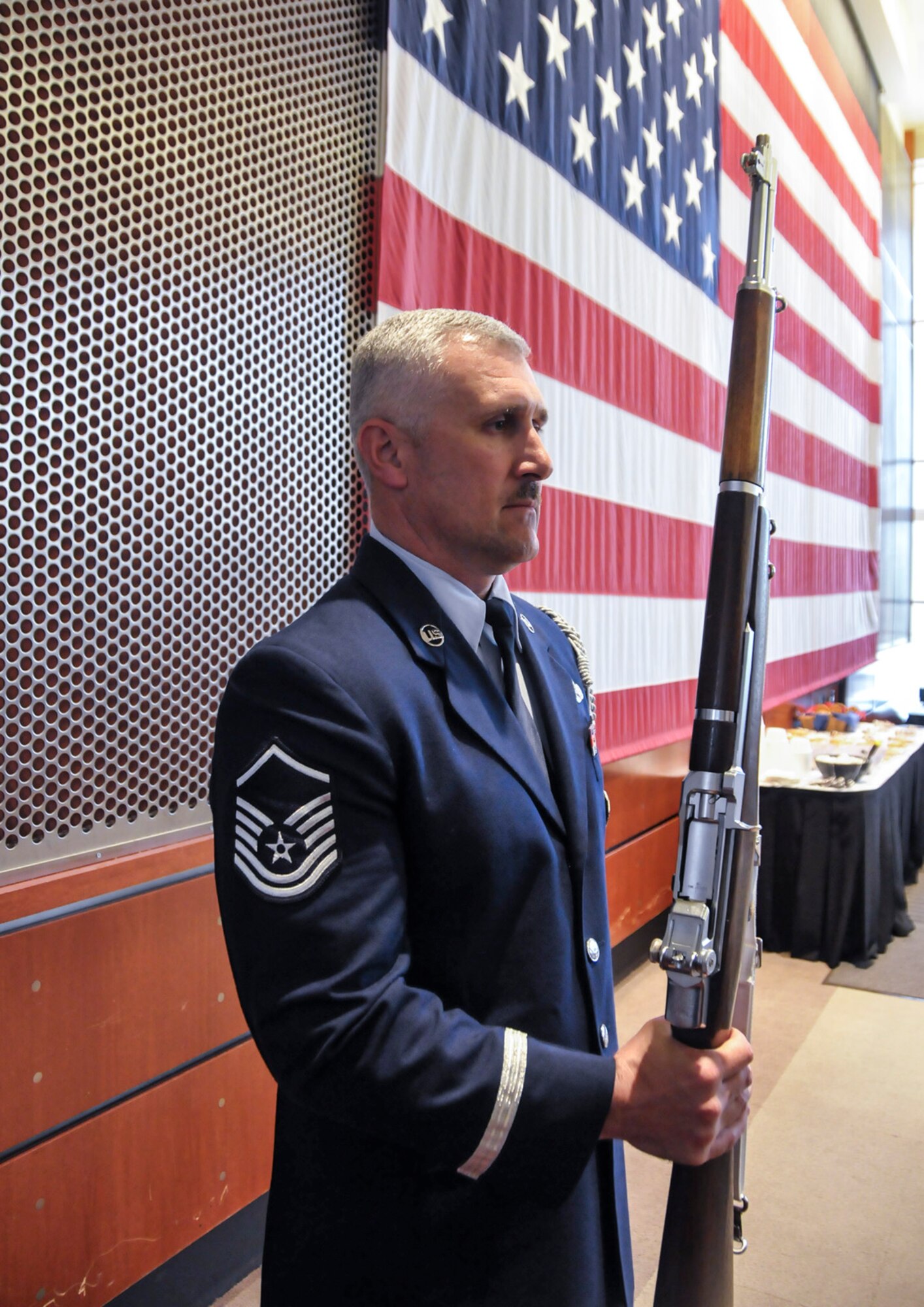 128th Air Refueling Wing Honor Guard NCO in charge, Master Sgt. David Coker, practices drill and ceremony prior to presenting the colors at the Rotary Club Luncheon held at the Milwaukee War Memorial, May 15, 2012. Coker is the Air National Guard’s 2014 Outstanding Honor Guard Program Manager of the Year. (U.S. Air National Guard photo by: 2nd Lt. Nathan T. Wallin/Released)