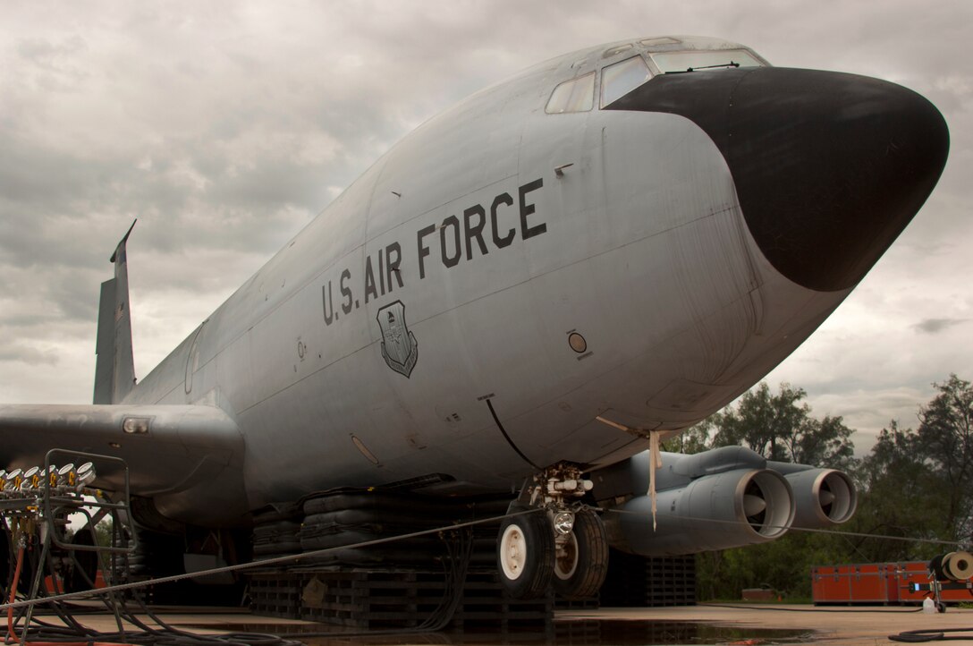 The 362nd Training Squadron, Crash Damaged Disabled Aircraft Recovery (CDDAR) team, used 26-ton airbag modules and associated equipment to completely lift a KC-135 Stratotanker July 29, 2014. Students work as a team to lift the aircraft off the ground a minimum of 8 inches, which can be applied to any aircraft that has skidded off the runway or is stuck in the mud, snow or any other terrain. (U.S. Air Force photo/Danny Webb/RELEASED)