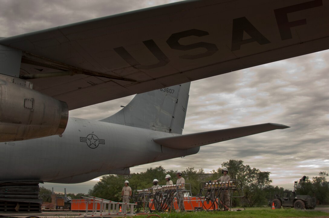 The 362nd Training Squadron, Crash Damaged Disabled Aircraft Recovery (CDDAR) team, used 26-ton airbag modules and associated equipment to completely lift a KC-135 Stratotanker July 29, 2014. Students work as a team to lift the aircraft off the ground a minimum of 8 inches, which can be applied to any aircraft that has skidded off the runway or is stuck in the mud, snow or any other terrain. (U.S. Air Force photo/Danny Webb/RELEASED)