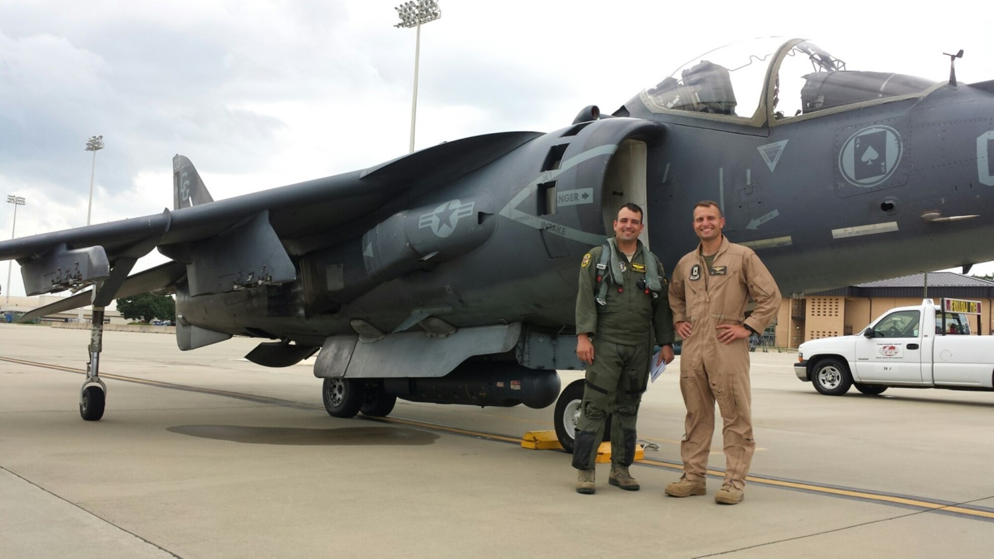 U.S. Air Force Major Kurt Bruggeman, 414th Fighter Group, Seymour Johnson Air Force Base, N.C., and U.S. Marine Corps Major Arthur Bruggeman, currently attending the U.S. Naval War College in Newport, R.I., pose for a photo after a training mission over Seymour Johnson June 24, 2014. (Courtesy photo)