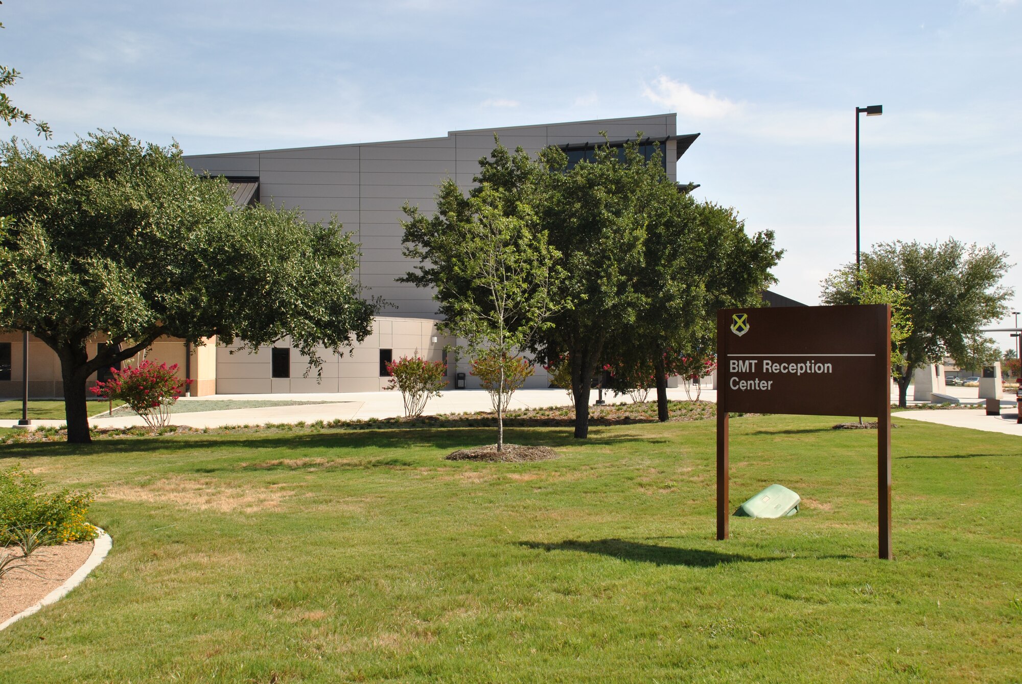 The new Recruit/Family In-processing and Information Center at Joint Base San Antonio-Lackland, Texas, officially opened its doors July 30 with a ribbon-cutting ceremony. The Air Force Civil Engineer Center managed construction of the $22 million dollar facility, which was built to welcome the more than 35,000 recruits as well as their 250,000 friends and family members, to the Air Force each year.  (U.S. Air Force Photo/Jennifer Schneider/released)
