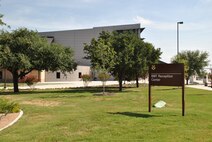 The new Recruit/Family In-processing and Information Center at Joint Base San Antonio-Lackland, Texas, officially opened its doors July 30 with a ribbon-cutting ceremony. The Air Force Civil Engineer Center managed construction of the $22 million dollar facility, which was built to welcome the more than 35,000 recruits as well as their 250,000 friends and family members, to the Air Force each year.  (U.S. Air Force Photo/Jennifer Schneider/released)