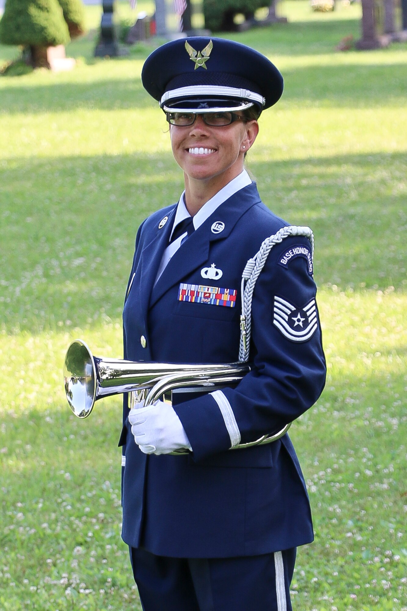 Tech. Sgt. Amy Ough, a New York Air National Guardsman at the Eastern Air Defense Sector in Rome, N.Y., holds a bugle during a recent Honor Guard rehearsal. A cancer survivor and mother of five, Ough is the Air National Guard’s Outstanding Honor Guard Member of the Year. (U.S. Air National Guard photo by Tim Jones/Released)