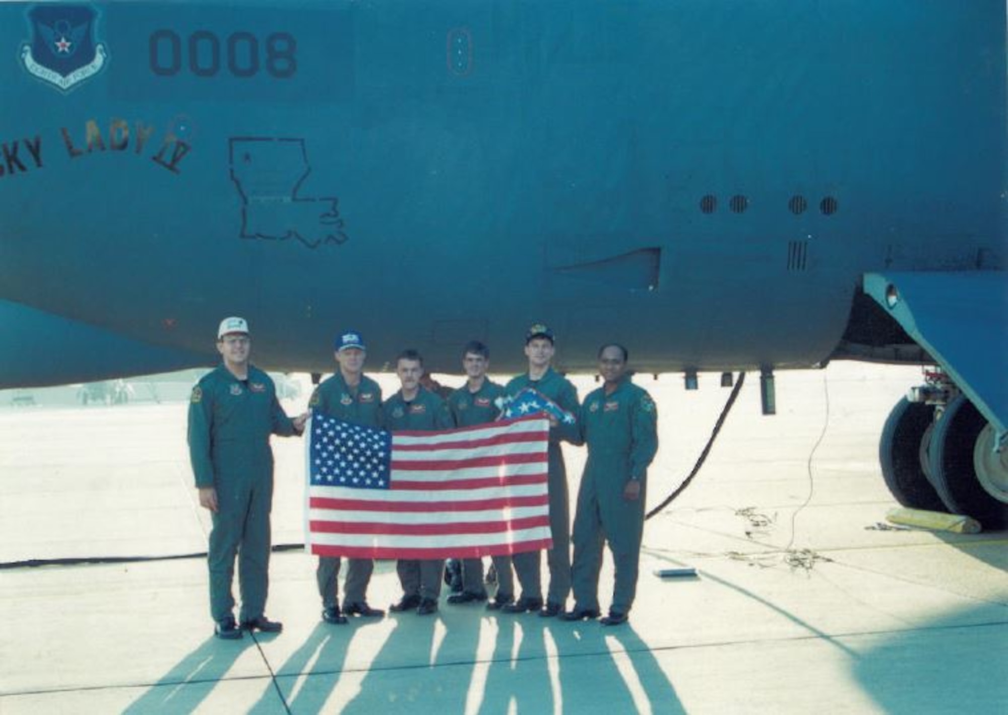 Crew of the Lucky Lady IV pose with their B-52H before embarking on Exercise Global Power 94-7, Aug. 1, 1994. From left to right: Col. James Hawkins, Capt. Terrence O'Grady, Capt. Todd Callahan, Capt. Russell Maclean, Capt. Stephen Pomeroy, Capt. Andre Mouton.