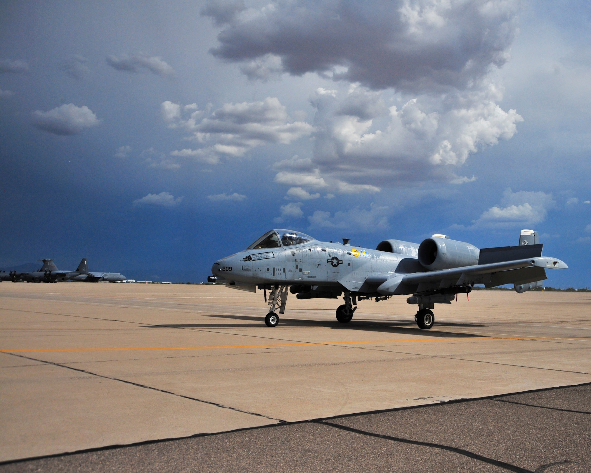 U.S. Air Force Col. Kevin E. Blanchard, 355th Fighter Wing commander taxis after his “fini” flight in an A-10 Thunderbolt II at Davis-Monthan Air Force Base, Ariz., July 30, 2104.  Blanchard is retiring after 23 years of service in the U.S. Air Force and more than 500 hours of combat over Iraq and Afghanistan.  (U.S. Air Force Photo by Airman 1st Class Chris Massey/Released)