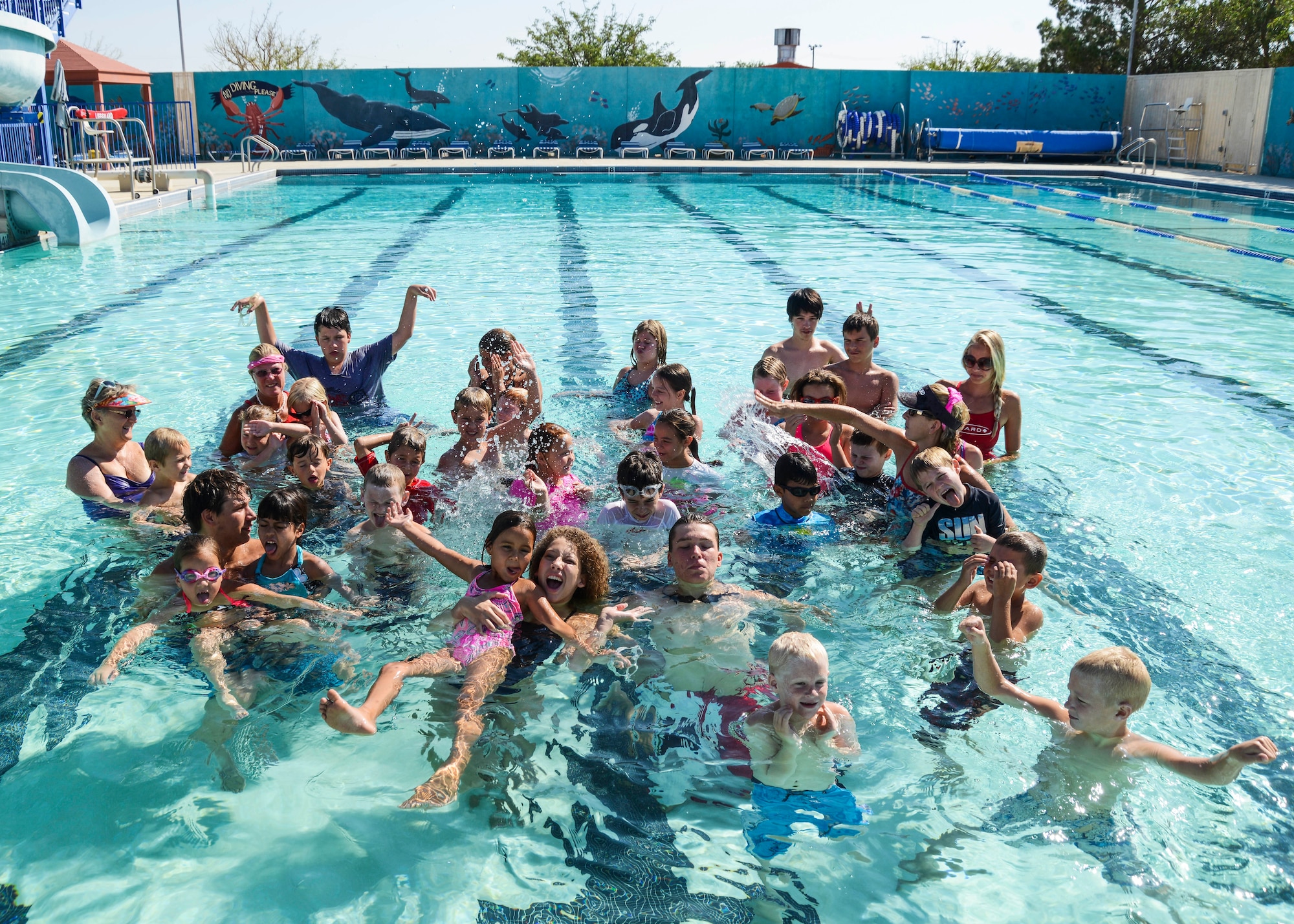 Swim camp at the Sonic Splash Pool builds on the basics of swimming, teaching water safety, breathing, types of strokes and pool rules. (U.S, Air Force photo by Rebecca Amber) 