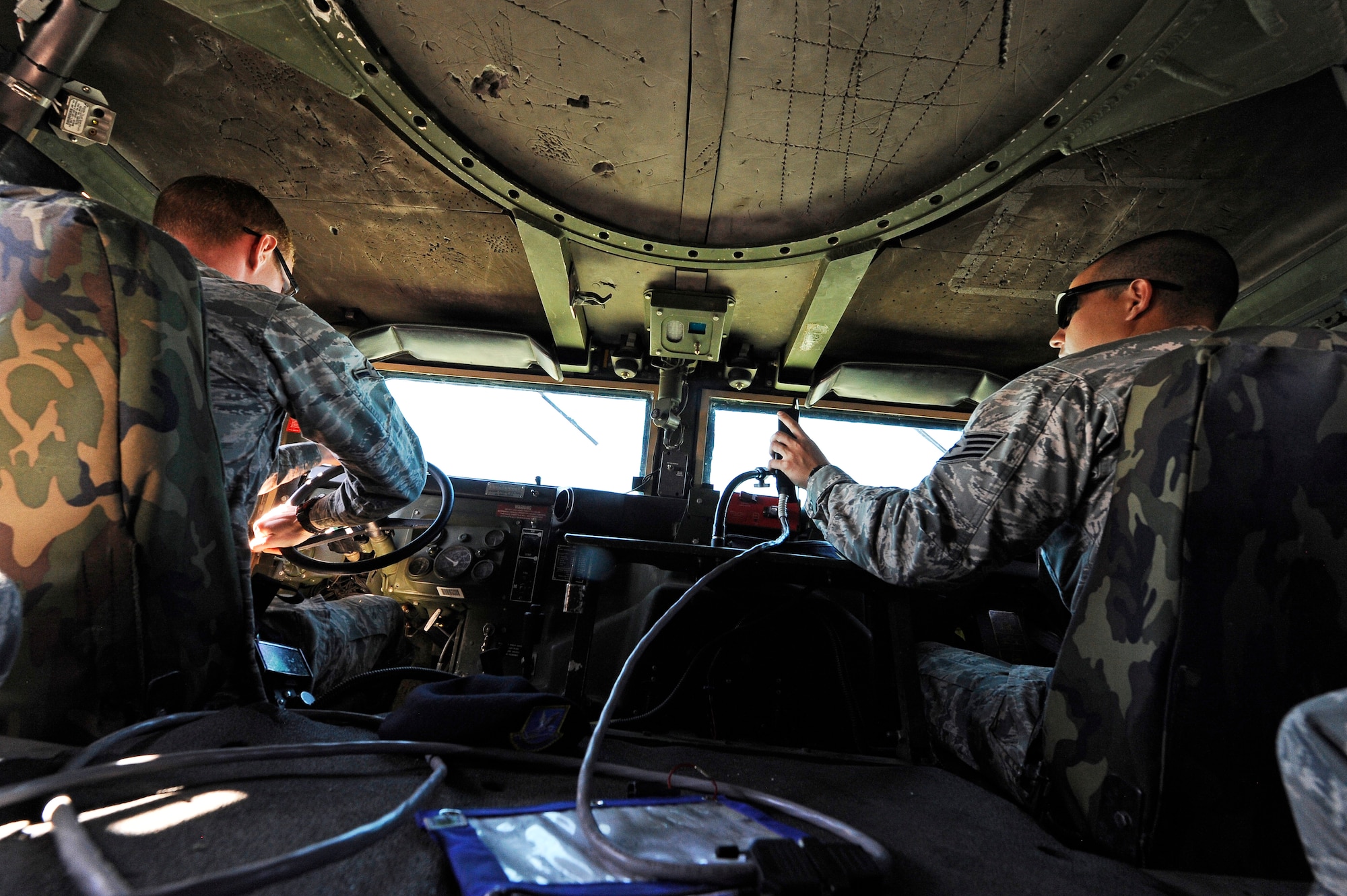 Airmen from the 341st Security Forces Group perform skid training on Malmstrom Air Force Base’s decommissioned flightline July 30. With the use of a skid, instructors can simulate driving on gravel roads, black ice, in snowy conditions and in situations where a vehicle may lose traction. (U.S. Air Force photo/Airman 1st Class Collin Schmidt)
