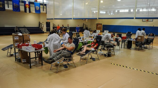 Members of Team Moody participate in a monthly blood drive at Moody Air Force Base, Ga., July 30, 2014. In order to donate blood, volunteers must undergo a short physical, an iron test and a medical history review to ensure they are healthy enough to donate. (U.S. Air Force photo by Airman 1st Class Alexis Millican/Released)