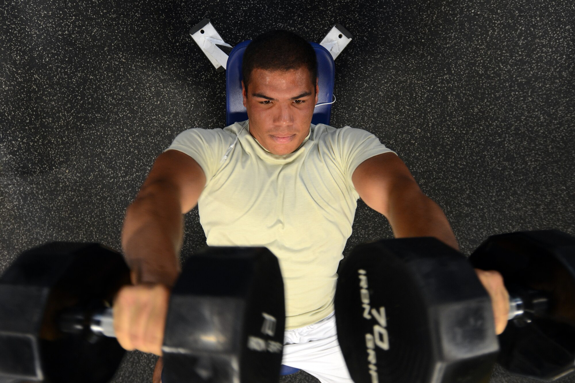 U.S. Air Force Airman 1st Class Aaron Price, with the 245th Air Traffic Control Squadron, South Carolina Air National Guard at McEntire Joint National Guard Base, S.C., maintains his physical fitness during a workout in the base gym May 28, 2013.  (U.S. Air National Guard photo by Tech. Sgt. Caycee Watson/Released)