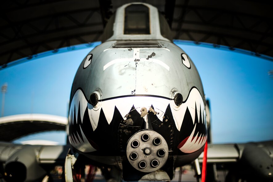 An A-10C Thunderbolt II sits under a sun shade at Moody Air Force Base, Ga., July 29, 2014. The A-10’s primary weapon is a single 30mm GAU-8/A seven-barrel Gatling gun. It can also carry up to 16,000 pounds of mixed ordnance such as cluster bomb units, joint direct attack munitions and AIM-9 Sidewinder missiles. (U.S. Air Force photo by Airman 1st Class Ryan Callaghan/Released)