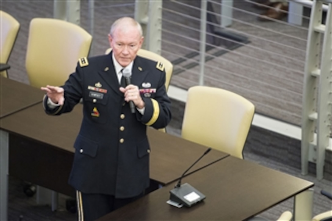 Army Gen. Martin E. Dempsey, chairman of the Joint Chiefs of Staff, addresses the 2014 U.S. Air Force Senior Leader Orientation on Joint Base Andrews, Md., July 30, 2014.  