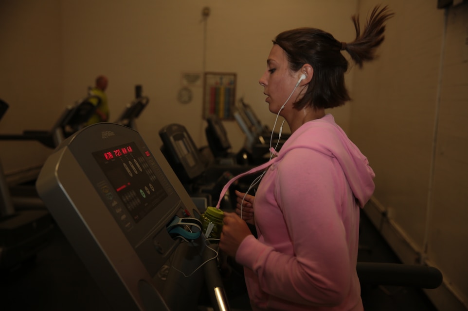 Cpl. Kelsey Marvel, military police, Provost Marshal's Office, runs on a treadmill at the West Gym cardio room, May 21, 2014. The Combat Center's gyms cater to many types of workouts for individuals who want to train at their own pace.