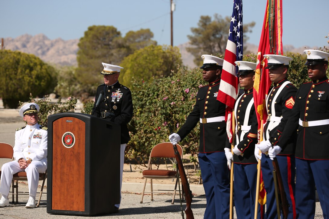 Maj. Gen. David H. Berger, Combat Center Commanding General, speaks to an audience of active duty service members, veterans, their families and local residents during the Memorial Day Remembrance at Twentynine Palms Memorial Cemetery May 26, 2014. Berger stayed after the ceremony to walk through the cemetery and pay tribute to each grave site.