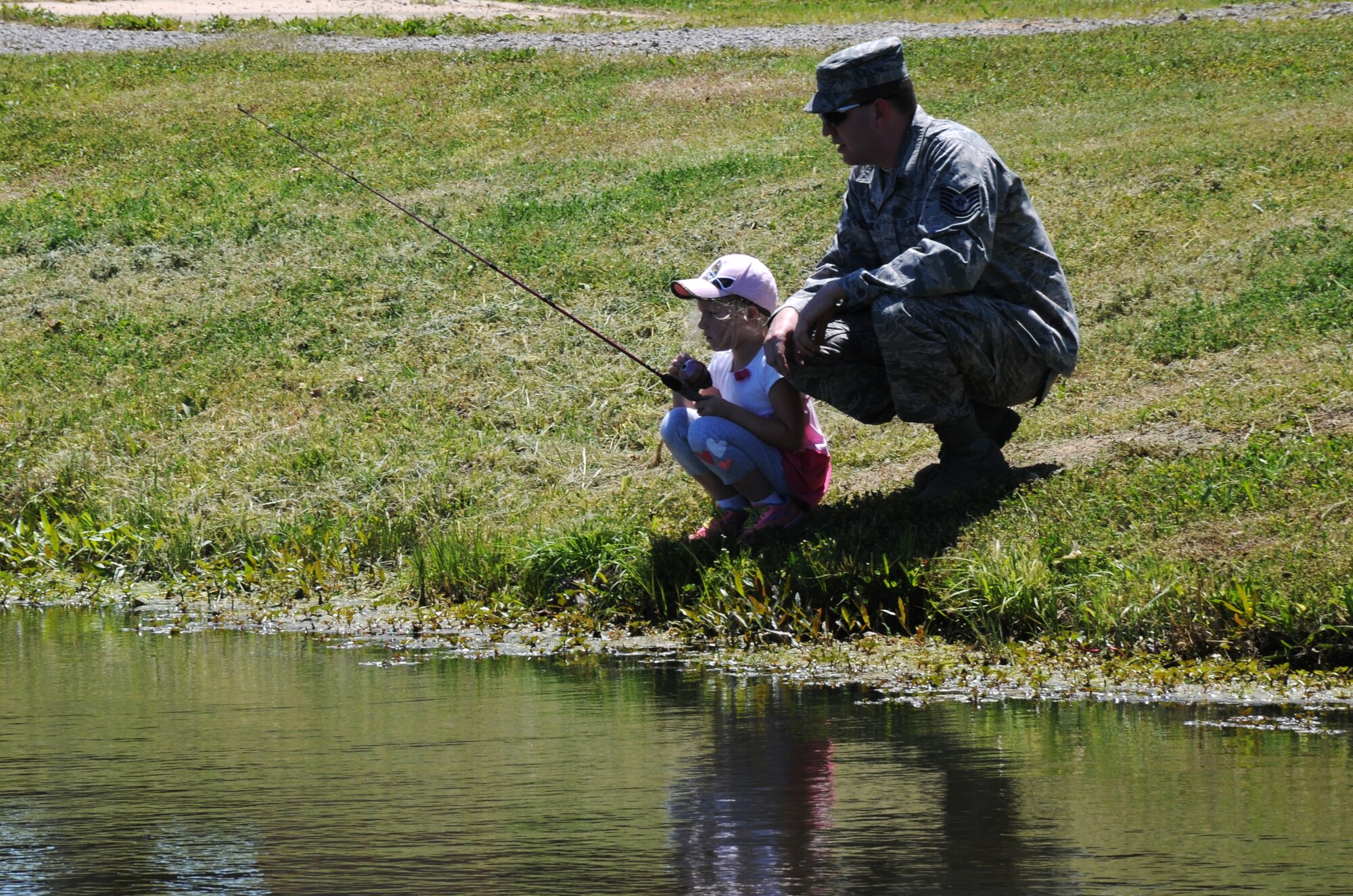 Airmen with the 188th Fighter Wing along their family members participated in the inaugural youth fishing derby following the wing’s 2nd annual Hawg Jawg 5K at Ebbing Air National Guard Base, Fort Smith, Arkansas, May 3, 2014. (U.S. Air National Guard photo by Airman First Class Cody Martin/Released)