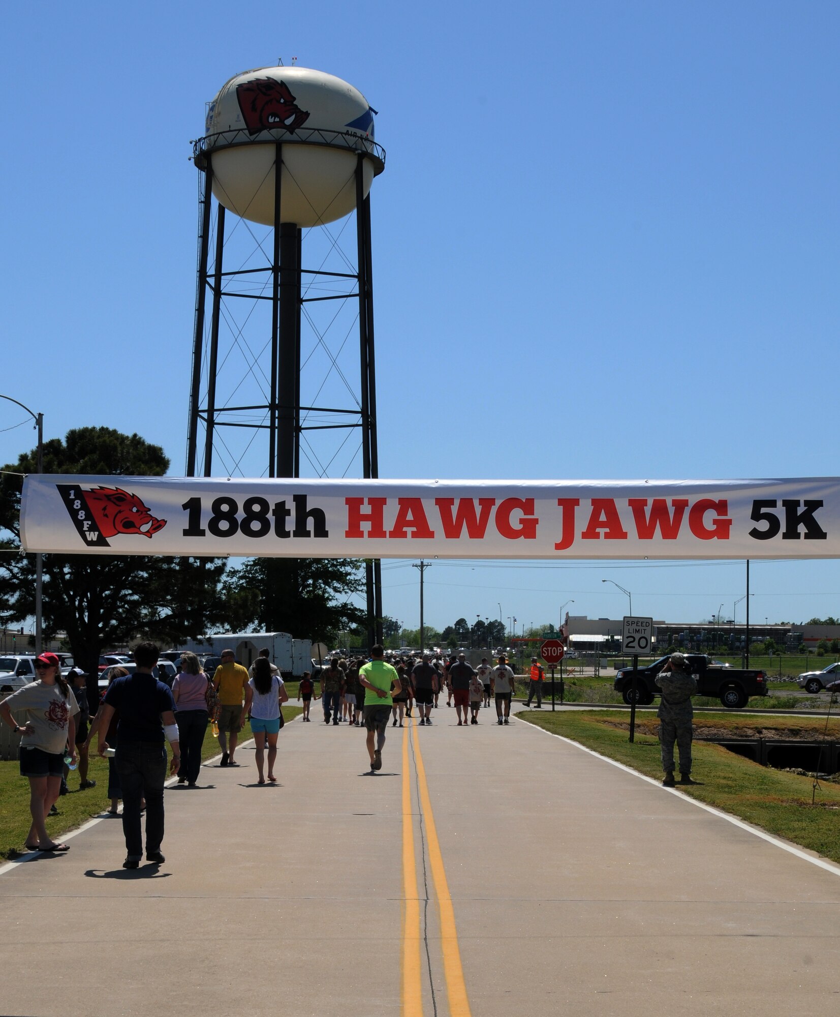 Airmen with the 188th Fighter Wing along with unit family members and retirees participated in the 2nd annual Hawg Jawg 5K at Ebbing Air National Guard Base, Fort Smith, Arkansas, May 3, 2014. Following the race, the wing hosted a fishing derby on base for 188th families. (U.S. Air National Guard photo by Airman First Class Cody Martin/Released)