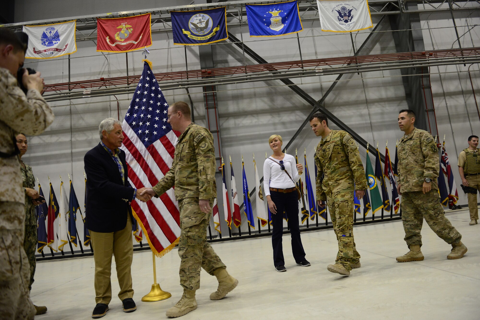 U.S. Secretary of Defense Chuck Hagel shakes the hand of U.S. Air Force 2nd Lt. Richard Mayle, 455th Expeditionary Operations Support Squadron at Bagram Airfield, Afghanistan June 1, 2014.  Hagel spoke to Airmen, Soldiers, Sailors and Marines deployed to Bagram, thanked the troops for their service and answered their questions during the visit.  (U.S. Air Force photo by Staff Sgt. Evelyn Chavez/Released)