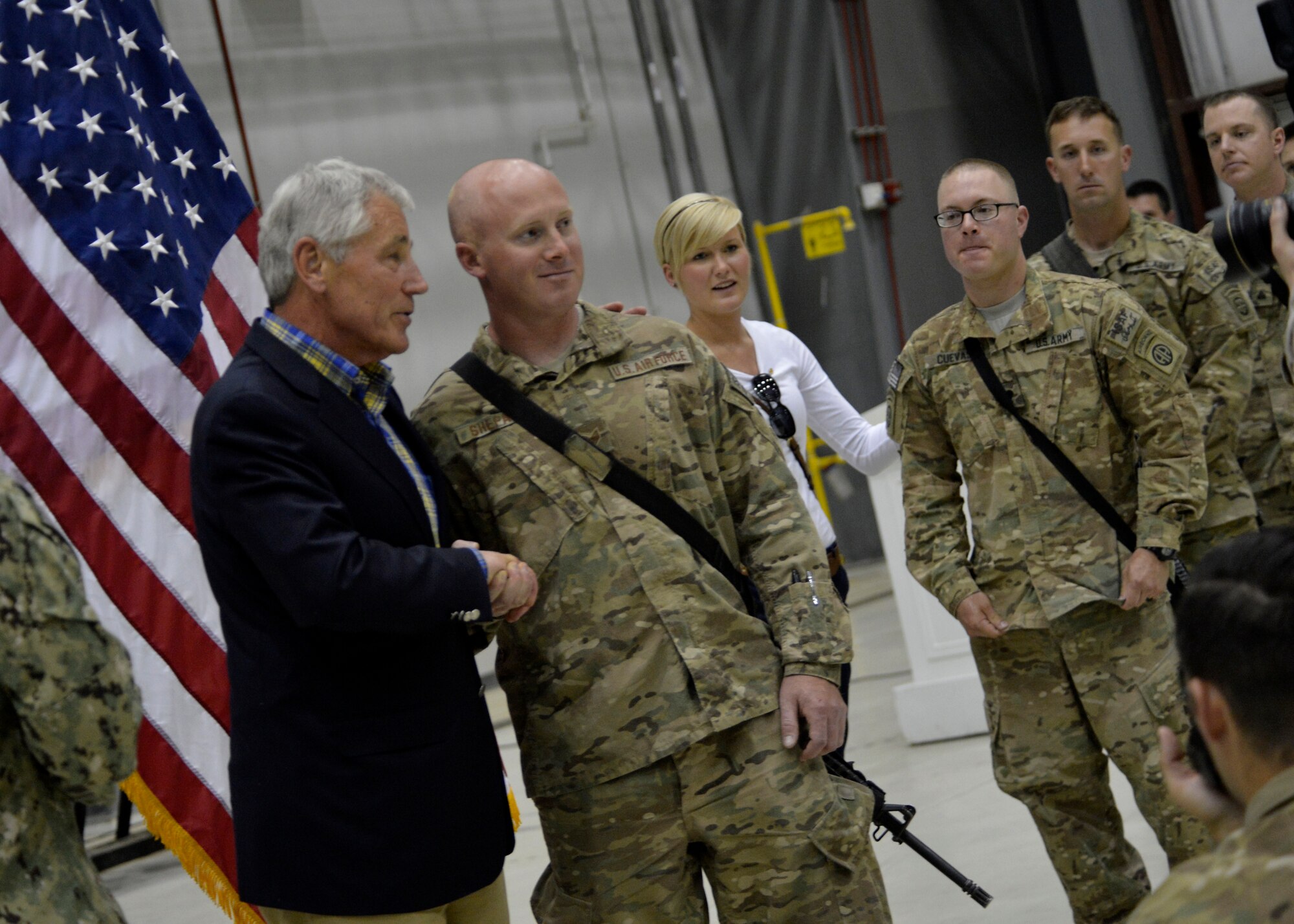 U.S. Secretary of Defense Chuck Hagel shakes the hand of U.S. Air Force Staff Sgt. James Shepard, 455th Expeditionary Aerial Port Squadron at Bagram Airfield, Afghanistan June 1, 2014.  Hagel visited Airmen, Soldiers, Sailors and Marines deployed to Bagram, he thanked them for their service and answered their questions.  (U.S. Air Force photo by Staff Sgt. Evelyn Chavez/Released)