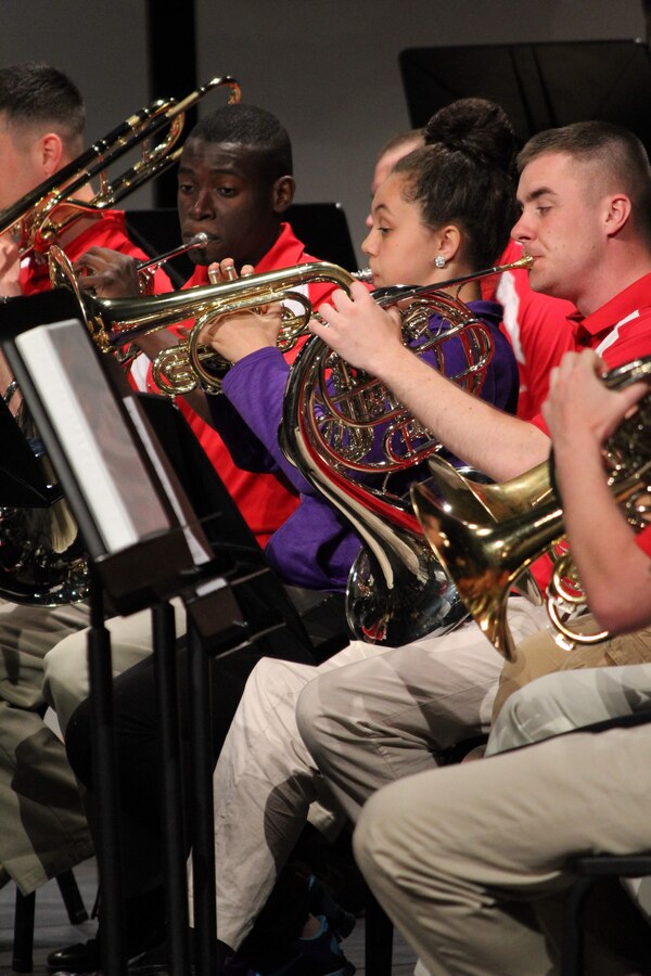 Members of Marine Corps Band Quantico perform with students from Elyria High School May 17, 2014. The band was in the Cleveland area after performing at the Cleveland International Tattoo and took an opportunity to visit local high schools to perform with them, offer advice and answer any questions about the life and experiences of a member in a Marine Corps band. (U.S. Marine Corps photo by Sgt. T.M. Stewman/Released)
