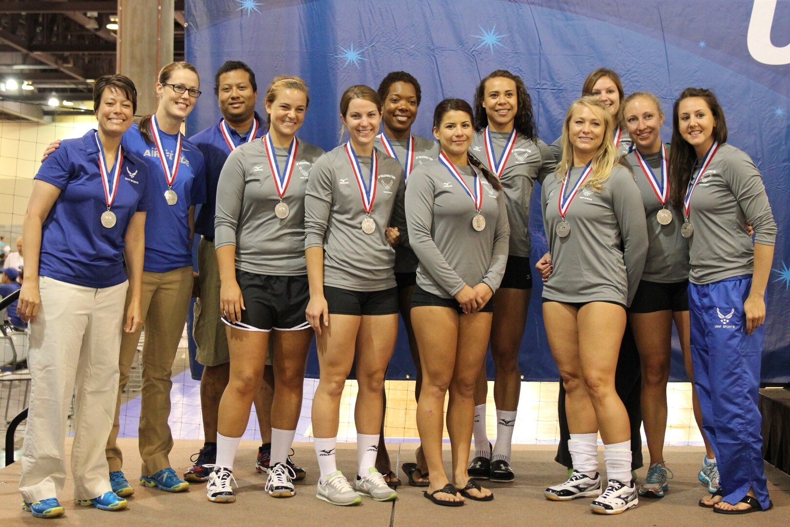 2014 Armed Forces Silver Medalists, Air Force Women.  From left to right:  OIC Ms. Linda Hampton (Arizona State Univ.); Asst. Coach Ms. Ashley Allen (Nicholas Univ.); Head Coach Mr. Nicki Holmes (North Carolina Central Univ.); 2d Lt Ingabritte Backlund (Nellis AFB, NV); 2d Lt Katherine Meinig (Davis-Monthan AFB, AZ); SSgt Shermika Harris (JB Langley-Eustis, VA); SrA Sebastiana Solis-Lopez (JB Charleston SC); SrA Amber Coley (Seymour Johnson, NC); A1C Ryanne Termini (Beale AFB, CA); 2d Lt Emily Scharfe (Travis AFB, CA); 1st Lt Carly Lacey (Eglin AFB, FL); SSgt Melissa Deardorff (Pope AFB, NC) 