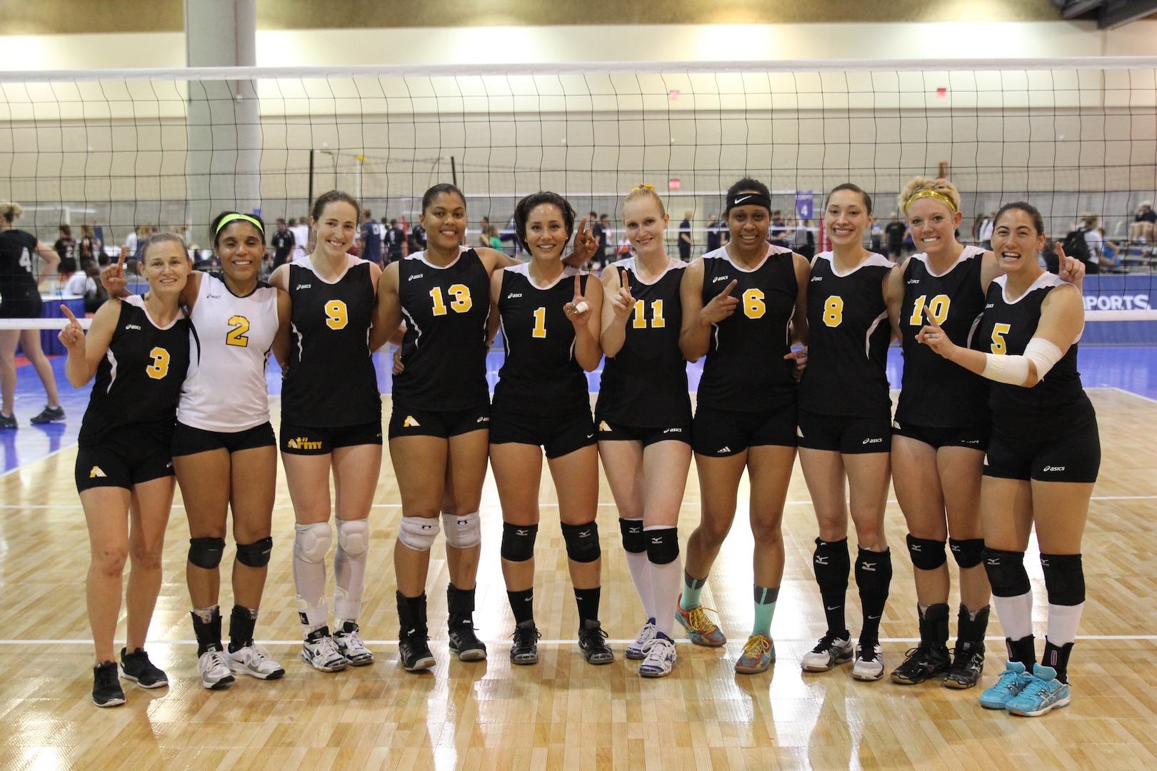 Army Women after their victory to capture the 2014 USA Women’s A National Volleyball Championship.  From left to right:  1LT Jodi Corcoran (Ft. Lee, VA); SGT Kamille King (ARNG-FL); CPT Jamie Pecha (Ft. Bragg, NC); PFC Jessica Glover (Walter Reed, MD); SPC Ettie Punimata (ARNG-UT); 1LT Alysia Franco (Ft. Bragg, NC); SPC Latoya Marshall (Ft. Sill, OK); SGT Jazmine Silafau (USAG Yongsan, Korea); 1LT Alexandra Giraud (Schofield Barracks, HI); SPC Meghan Patterson (Ft. Leavenworth, KS).