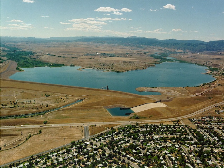 Chatfield Lake lies on the South Platte River at its confluence with Plum Creek, near the foothills of the Rocky Mountains about 25 miles southwest of downtown Denver. The lake is 2 miles long and has an average depth of 47 feet. The lake drains an area of approximately 3,018 square miles. The 1,479-surface-acre lake has a storage capacity of 27,046 acre-feet.