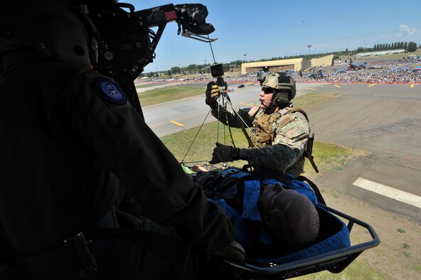 Capt. Marcus Truman, 66th Training Squadron assistant director of operations, performs a demonstration on the UH-1N Iroquois above SkyFest 2014 at Fairchild Air Force Base, Wash., June 1, 2014. The model of light-lift utility helicopter provides both airlift and search and rescue services. SkyFest is Fairchild’s air show and open house, giving the local and regional community the opportunity to view Airmen and our resources. The event typically draws more than 150,000 people. SkyFest 2008, headlined by the Blue Angels, was the largest event held in Spokane since the 1974 World’s Fair. (U.S. Air Force photo by Staff Sgt. Veronica Montes/Released)