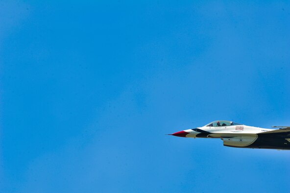 The Air Force Thunderbirds aerial demonstration team flies in formation during SkyFest 2014 at Fairchild Air Force Base, Wash., May 31, 2014. The Thunderbirds have flown the F-16 Fighting Falcon since August 1982, more than half of the team's history. SkyFest is Fairchild’s air show and open house, giving the local and regional community the opportunity to view Airmen and our resources. The event typically draws more than 150,000 people. SkyFest 2008, headlined by the Blue Angels, was the largest event held in Spokane since the 1974 World’s Fair. (U.S. Air Force photo by Staff Sgt. Alexandre Montes/Released)