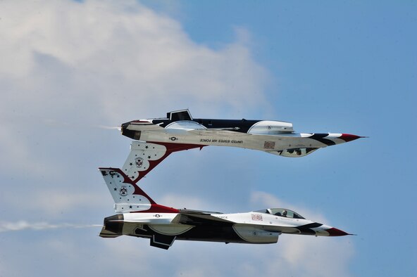 The Air Force Thunderbirds aerial demonstration team flies in formation during SkyFest 2014 at Fairchild Air Force Base, Wash., May 31, 2014. The Thunderbirds have flown the F-16 Fighting Falcon since August 1982, more than half of the team's history. SkyFest is Fairchild’s air show and open house, giving the local and regional community the opportunity to view Airmen and our resources. The event typically draws more than 150,000 people. SkyFest 2008, headlined by the Blue Angels, was the largest event held in Spokane since the 1974 World’s Fair. (U.S. Air Force photo by Staff Sgt. Alexandre Montes/Released)