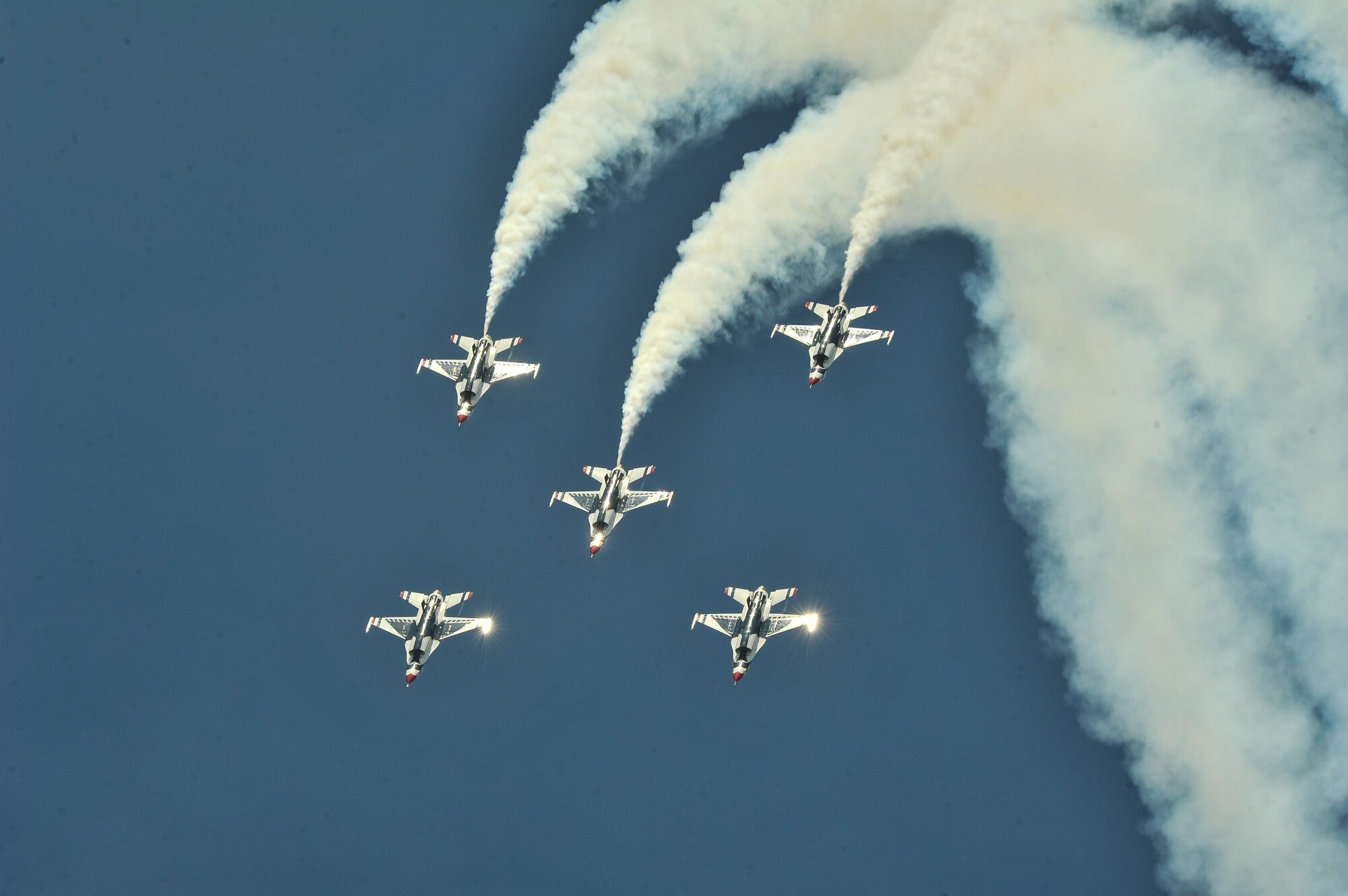 The Air Force Thunderbirds aerial demonstration team flies in formation during SkyFest 2014 at Fairchild Air Force Base, Wash., May 31, 2014. The Thunderbirds have flown the F-16 Fighting Falcon since August 1982, more than half of the team's history. SkyFest is Fairchild’s air show and open house, giving the local and regional community the opportunity to view Airmen and our resources. The event typically draws more than 150,000 people. SkyFest 2008, headlined by the Blue Angels, was the largest event held in Spokane since the 1974 World’s Fair. (U.S. Air Force photo by Staff Sgt. Alexandre Montes/Released)