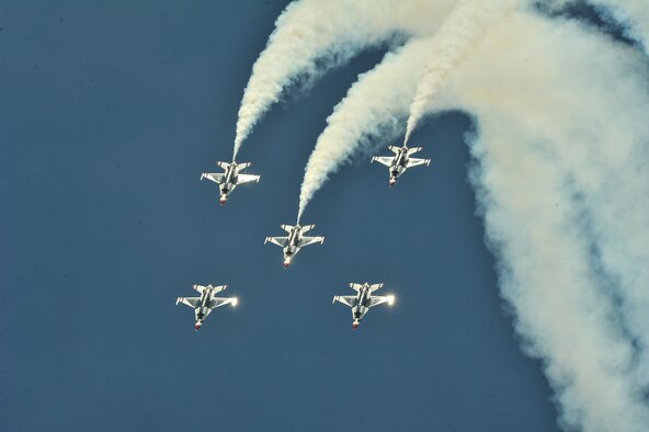 The Air Force Thunderbirds aerial demonstration team flies in formation during SkyFest 2014 at Fairchild Air Force Base, Wash., May 31, 2014. The Thunderbirds have flown the F-16 Fighting Falcon since August 1982, more than half of the team's history. SkyFest is Fairchild’s air show and open house, giving the local and regional community the opportunity to view Airmen and our resources. The event typically draws more than 150,000 people. SkyFest 2008, headlined by the Blue Angels, was the largest event held in Spokane since the 1974 World’s Fair. (U.S. Air Force photo by Staff Sgt. Alexandre Montes/Released)