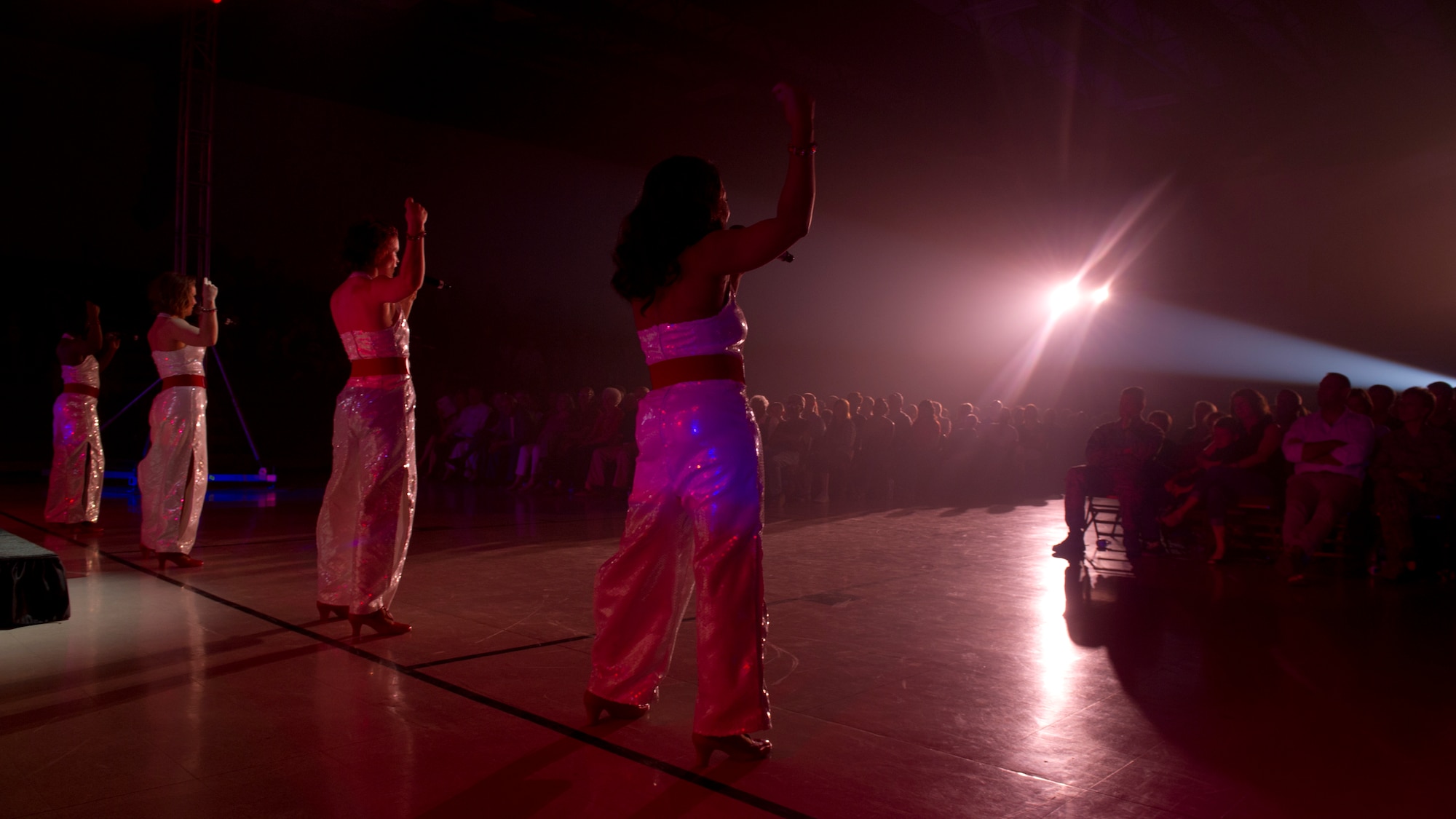 Members of Tops in Blue perform a song and dance for the crowd during their live concert at Tays Center, Alamogordo, N.M., May 31. Tops in Blue is comprised of vocalists, musicians, dancers and technicians serving in the U.S. Air Force. The group’s primary mission is to perform for military personnel and their families throughout the world. (U.S. Air Force photo by Airman 1st Class Aaron Montoya / Released)