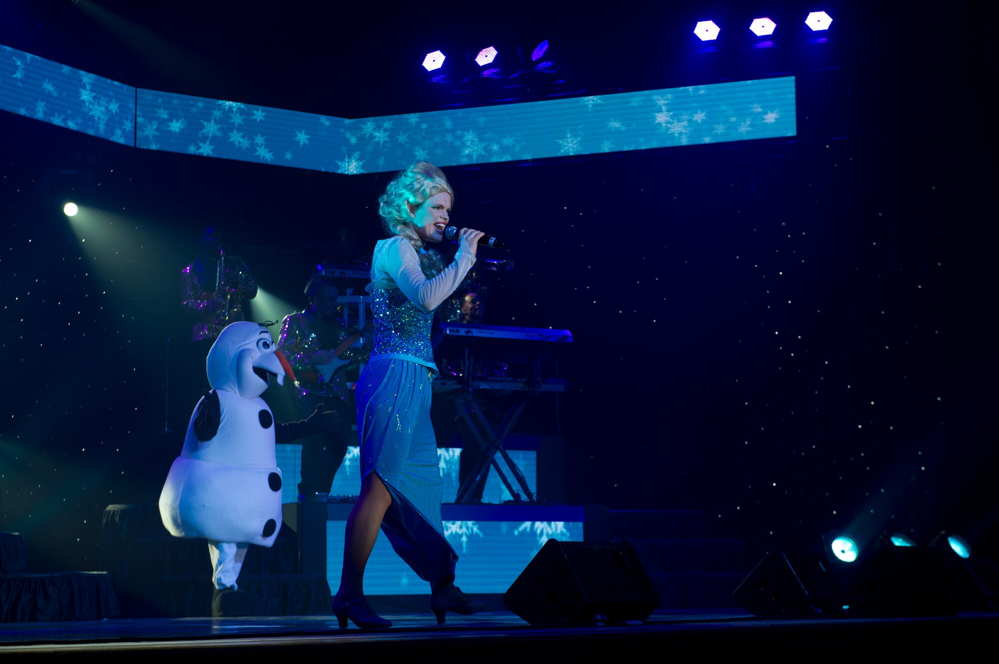 Members of Tops in Blue perform various Disney themed songs utilizing characters from well known movies during their live concert at Tays Center, Alamogordo, N.M., May 31. Tops in Blue is comprised of vocalists, musicians, dancers and technicians serving in the U.S. Air Force. The group’s primary mission is to perform for military personnel and their families throughout the world. (U.S. Air Force photo by Airman 1st Class Aaron Montoya / Released)
