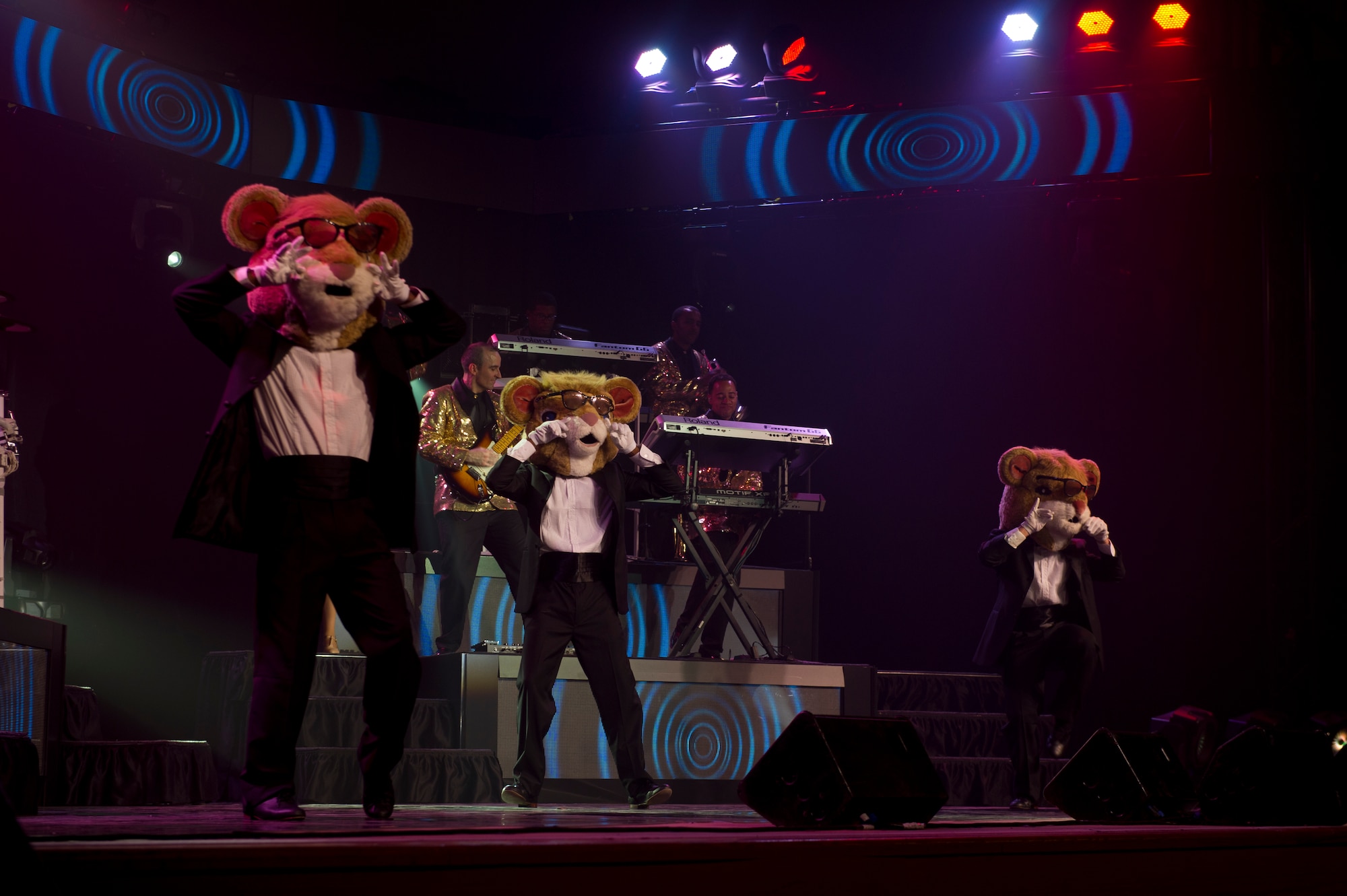 Members of Tops in Blue perform various Disney themed songs utilizing characters from well known movies during their live concert at Tays Center, Alamogordo, N.M., May 31. Tops in Blue is comprised of vocalists, musicians, dancers and technicians serving in the U.S. Air Force. The group’s primary mission is to perform for military personnel and their families throughout the world. (U.S. Air Force photo by Airman 1st Class Aaron Montoya / Released)