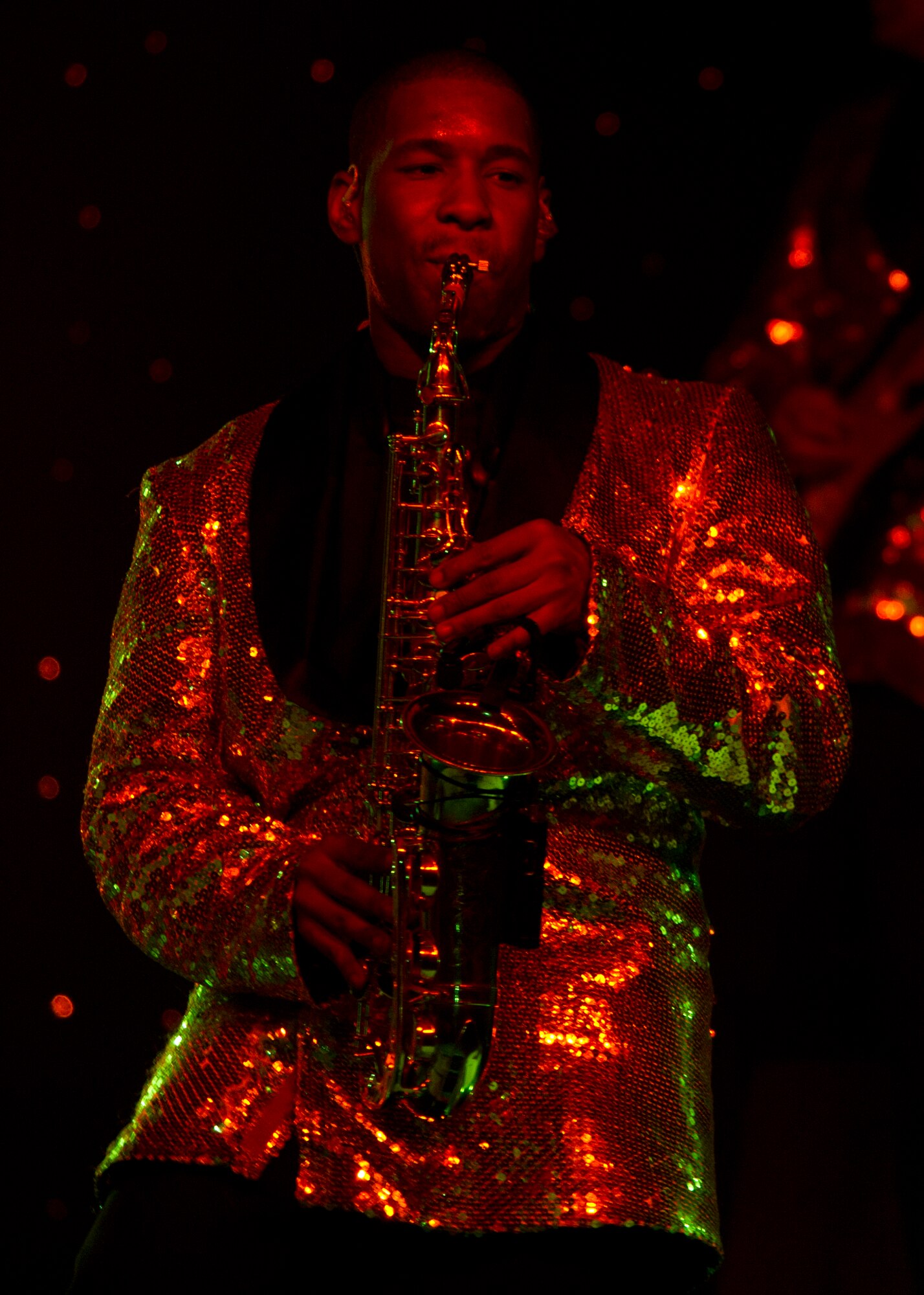 Senior Airman Bobby Lucas, 100th Civil Engineer Squadron fire protection journeyman, plays the saxophone during the Tops in Blue performance at Tays Center, Alamogordo, N.M., May 31. Tops in Blue is comprised of vocalists, musicians, dancers and technicians serving in the U.S. Air Force. The group’s primary mission is to perform for military personnel and their families throughout the world. (U.S. Air Force photo by Airman 1st Class Aaron Montoya / Released)