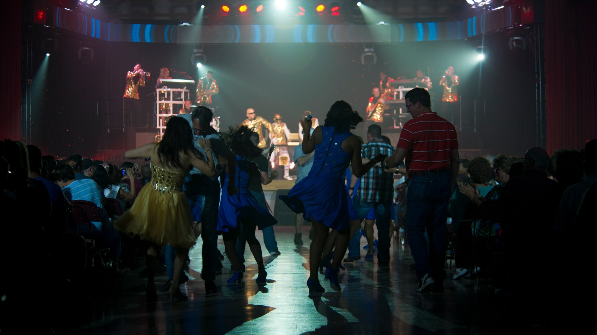 Members of Tops in Blue perform a song and dance during the live concert at Tays Center, Alamogordo, N.M., May 31. Tops in Blue is comprised of vocalists, musicians, dancers and technicians serving in the U.S. Air Force. The group’s primary mission is to perform for military personnel and their families throughout the world. (U.S. Air Force photo by Airman 1st Class Aaron Montoya / Released)