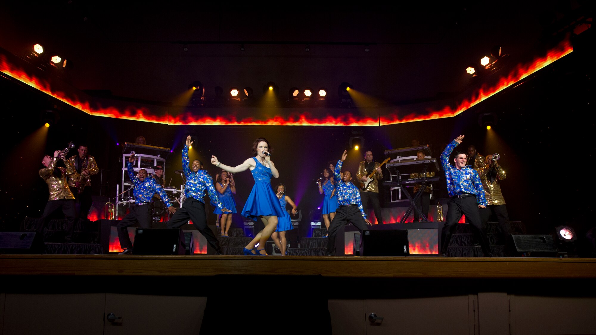 Members of Tops in Blue perform a song and dance during the live concert at Tays Center, Alamogordo, N.M., May 31. Tops in Blue is comprised of vocalists, musicians, dancers and technicians serving in the U.S. Air Force. The group’s primary mission is to perform for military personnel and their families throughout the world. (U.S. Air Force photo by Airman 1st Class Aaron Montoya / Released)
