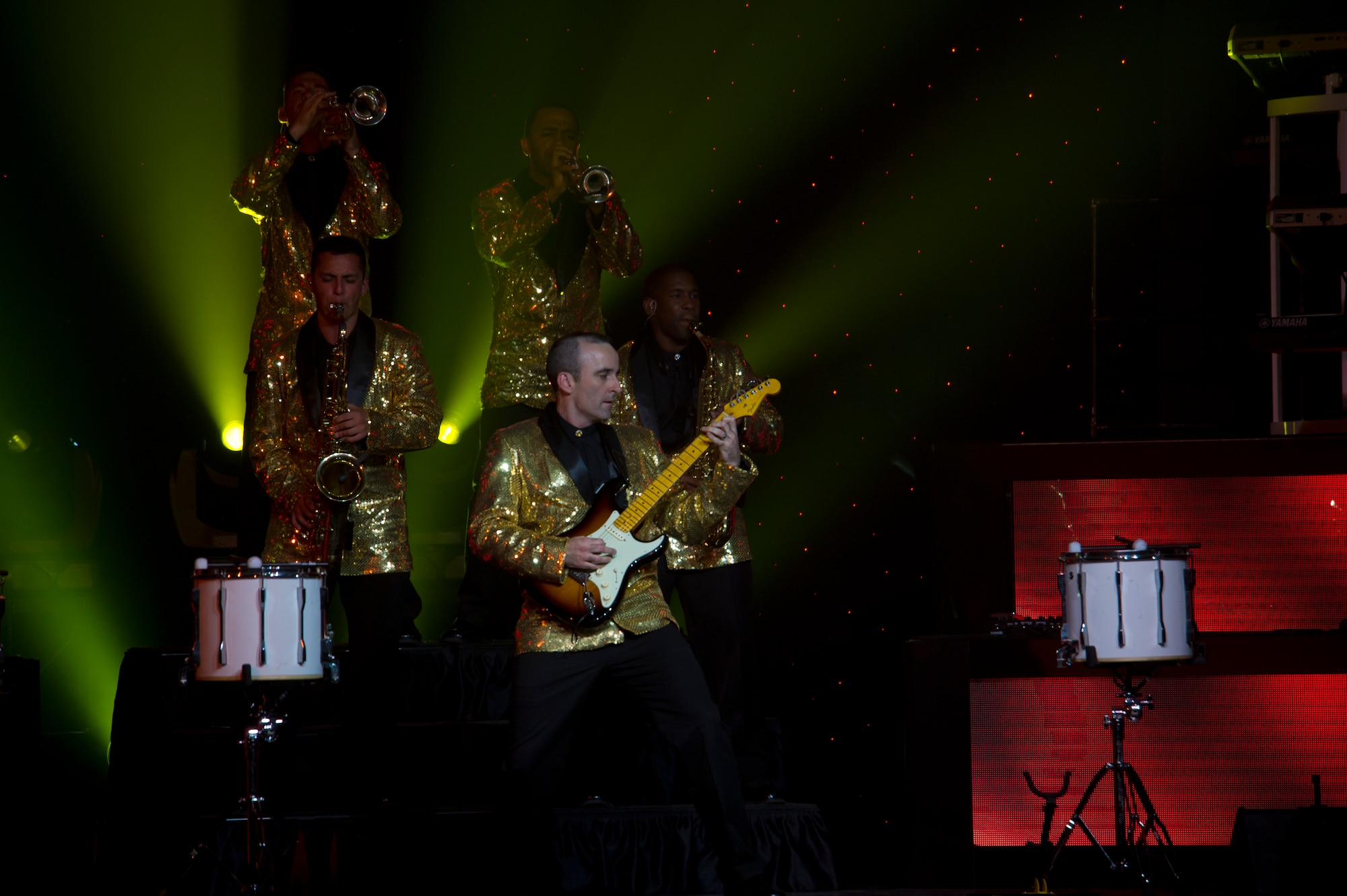Master Sgt. Justin Worley, 744th Communications Squadron cyber transport craftsman, plays a guitar solo during the Tops in Blue performance at Tays Center, Alamogordo, N.M., May 31. Tops in Blue is comprised of vocalists, musicians, dancers and technicians serving in the U.S. Air Force. The group’s primary mission is to perform for military personnel and their families throughout the world. (U.S. Air Force photo by Airman 1st Class Aaron Montoya / Released)