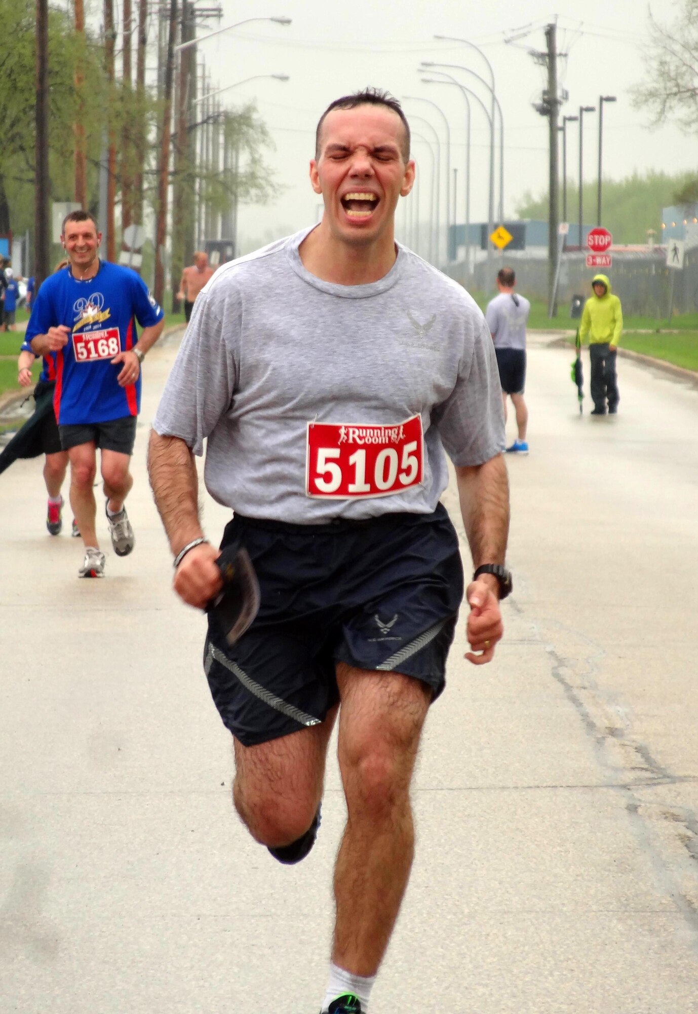 Maj. Roberto Andino, Detatchment 1, First Air Force strategy planner, "finishes strong" during the Royal Canadian Air Force half marathon in Winnipeg, Manitoba, Canada, May 25, 2014. Detachment 1 provides the Canadian North American Aerospace Defense Command Region with U.S. Air Force liaison and expertise at the Combined Aerospace Operations Center and Air Division Headquarters. Andino was one of six American Airmen who participated in the event. (Courtesy photo by Jennifer Servant)