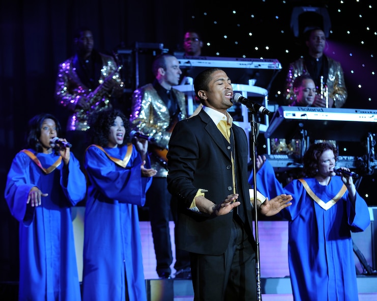 U.S. Air Force Senior Airman Charles Cooper, Whiteman Air Force Base, Mo., sings “All of Me” with fellow Airmen during the Tops in Blue’s 60th Anniversary Tour May 26, 2014, at the Abilene Civic Center in Abilene, Texas. With a vision created by Maj. Alvin Reilly, Tops in Blue began in 1953 to recognize the high caliber of amateur entertainment available within the Air Force. (U.S. Air Force photo by Airman 1st Class Kedesha Pennant/Released)