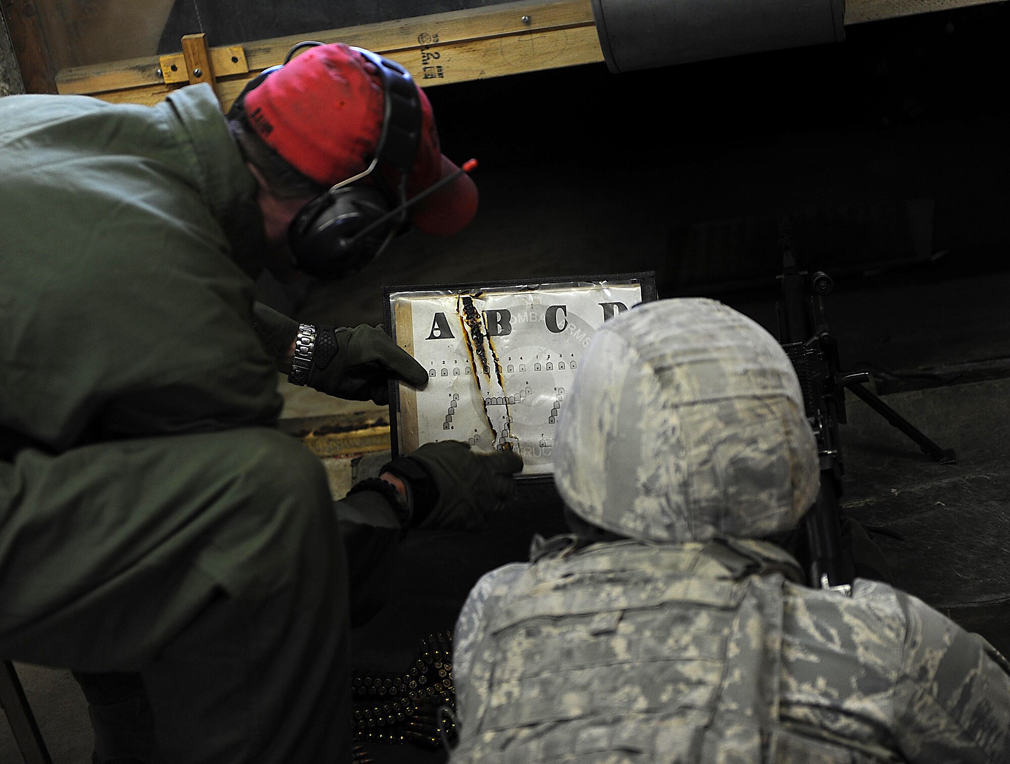 MINOT AIR FORCE BASE, N.D. -- Airmen go through the 5th Security Forces Squadron Combat Arms Training & Maintenance course at Minot Air Force Base, N.D., May 28,2014, to prep for deployments and needed qualifications for a variety of weapons systems. CATM instructors teach two classes a day plus a remedial class, pushing through 125 students a week. Safety is vital when firing a weapon, and when the CATM members are out on the line with students, they take every precaution to ensure everyone leaves unharmed. (U.S. Air Force photos/Senior Airman Kristoffer Kaubisch)