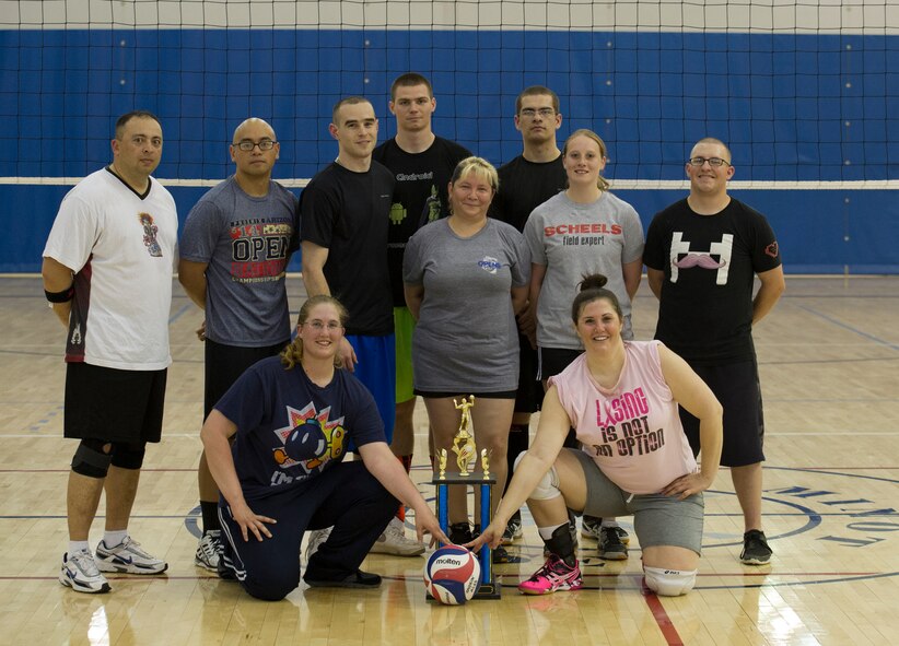 The 91st Missile Maintenance Squadron played the 5th Logistics Readiness Squadron during the intramural volleyball championship game May 28 at Macadoo Fitness Center located at Minot Air Force Base, N.D. Following the two game championship series, the 91st Missile Maintenance Squadron brought home the championship trophy after winning two games in a row. (U.S. Air Force photo/Senior Airman Andrew Crawford)
