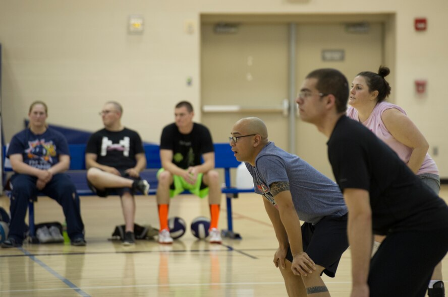 The 91st Missile Maintenance Squadron played the 5th Logistics Readiness Squadron during the intramural volleyball championship game May 28 at Macadoo Fitness Center located at Minot Air Force Base, N.D. Following the two game championship series, the 91st Missile Maintenance Squadron brought home the championship trophy after winning two games in a row. (U.S. Air Force photo/Senior Airman Andrew Crawford)